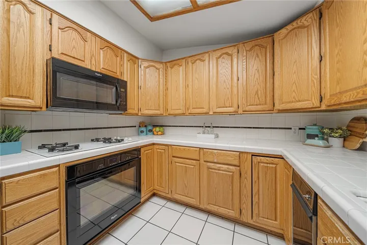 Gast cook top, microwave, oven, dishwasher, (refrigerator not in image) all remain.