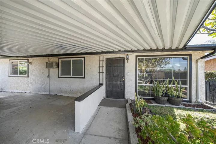 Covered breezeway to the front door.