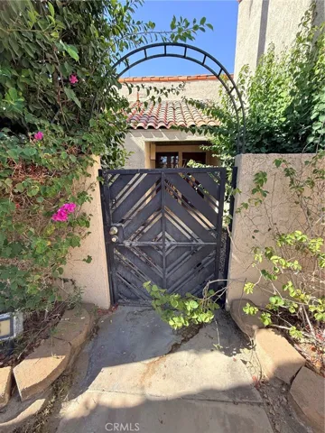 Gate to courtyard in the front of the condo.