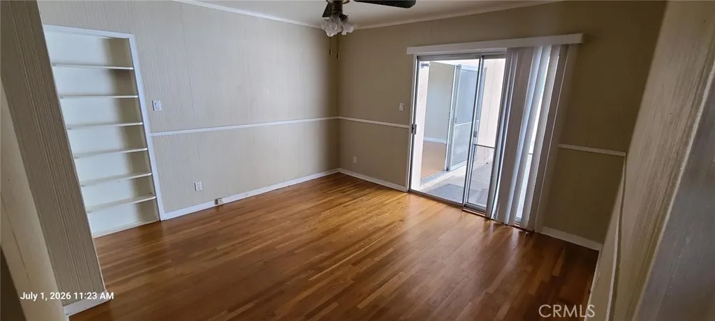 1 of 4 bedrooms, this one opens to rear coverd patio.