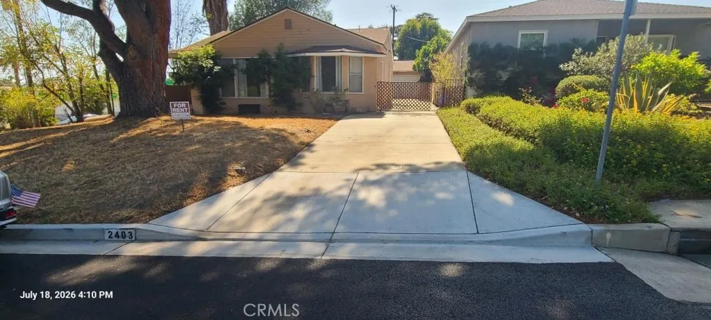 Lots of cement drive and parking.
