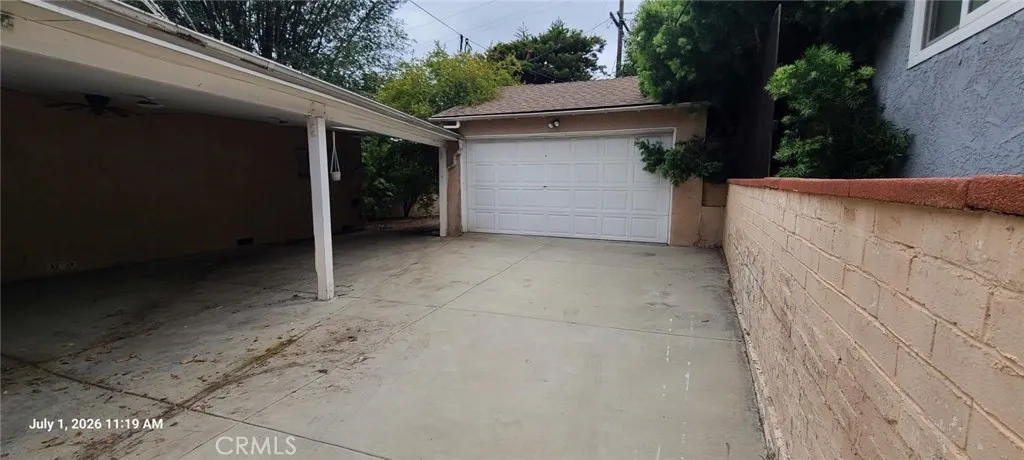 rear covered patio area, and 2-car Garage.