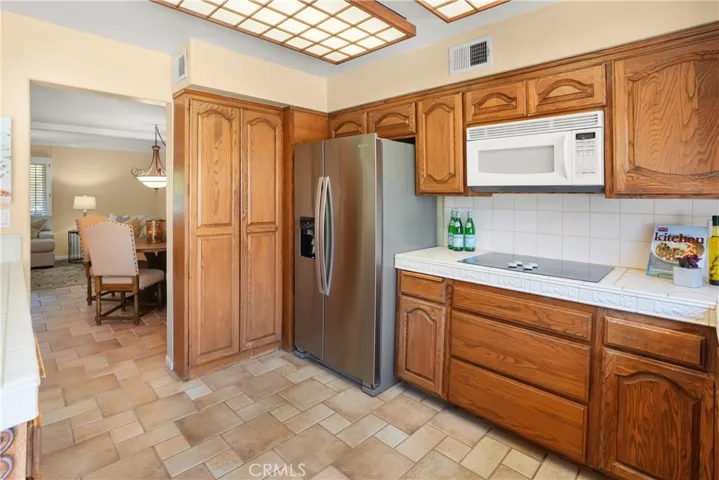 kitchen with entry to dining area