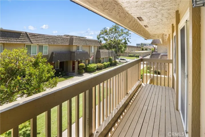 Balcony of master bedroom overlooking lush greenbelt