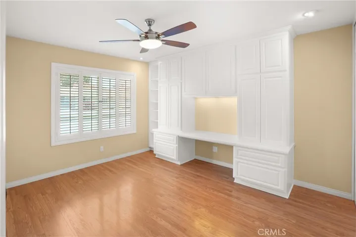 Upstairs bedroom with custom build in cabinets was used as a hobby room