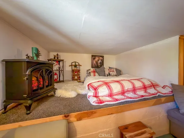 Downstairs is another area used for relaxation with a sleeping loft as well.