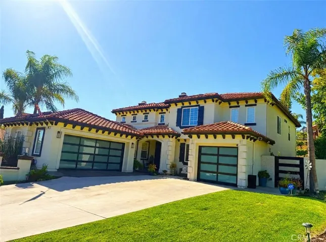 Front of h, new side doorsome. New garage doors