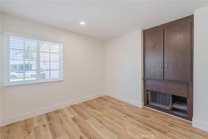 1st Bedroom/Office has built-ins as well as a hanging closet.