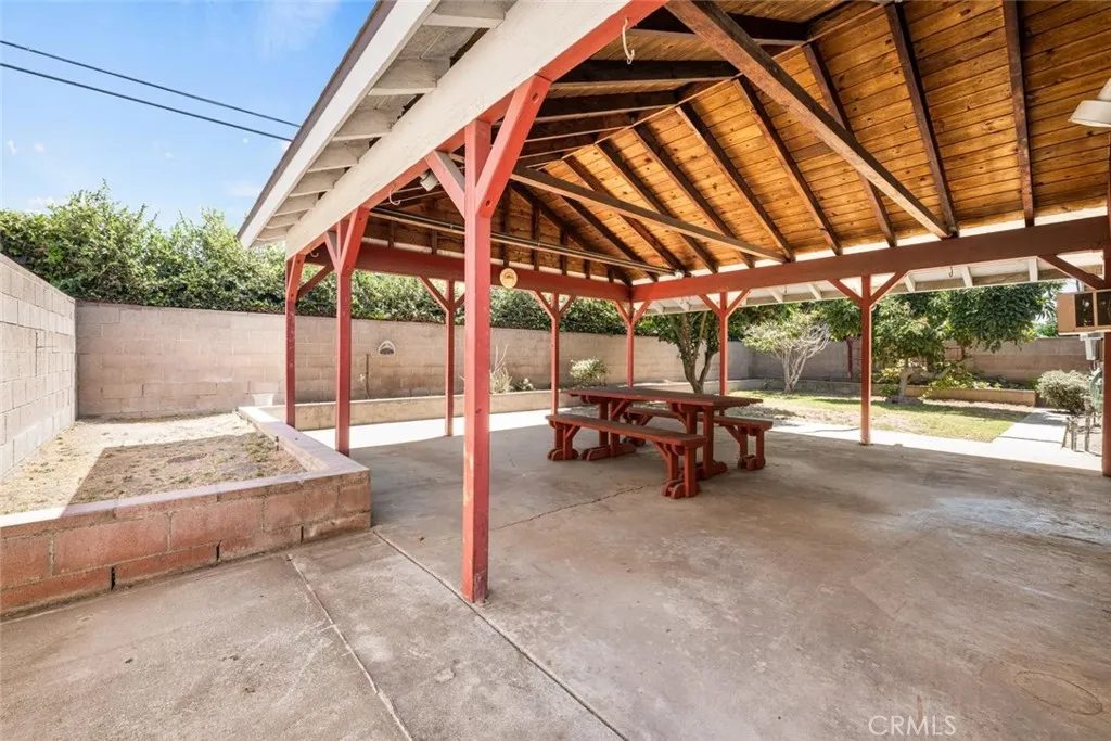 Spacious backyard with massive covered patio.
