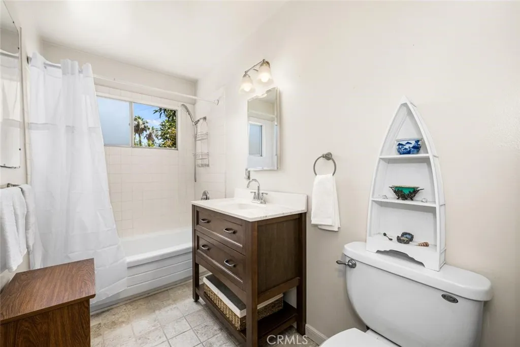 Main Bathroom full bath with tub and shower.