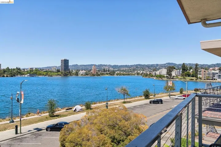 Balcony with metal cable railings providing expansive water frontage