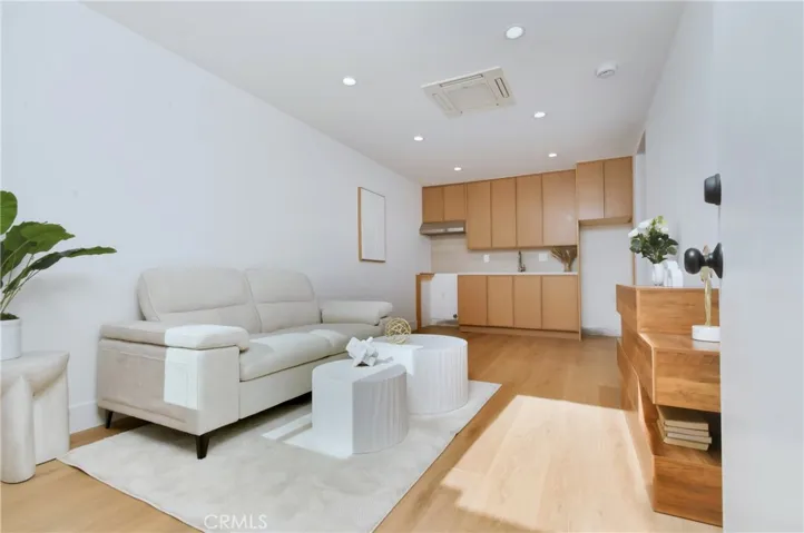 ADU - Bright, open-concept living and kitchen area featuring premium finishes and a flowing layout.