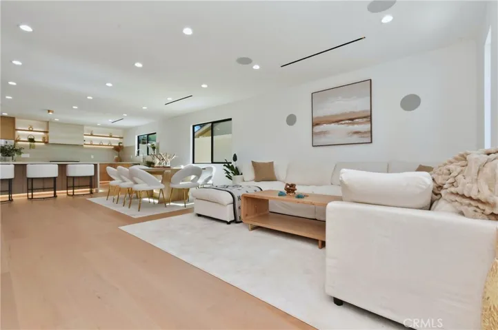 Detailed view of the custom media center and shelving, offering excellent storage and a sleek modern aesthetic