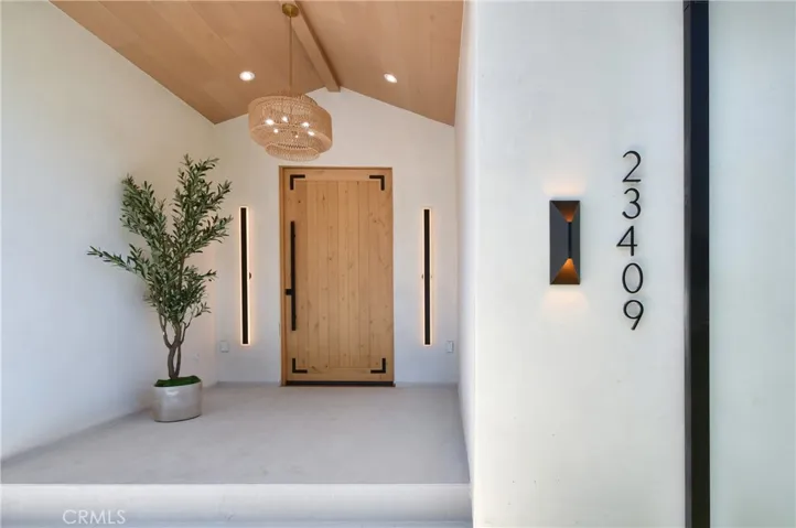 Sleek architectural details framing a minimalist entry alcove with clean, modern lines