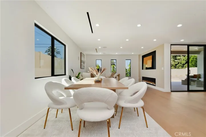 Expansive great room view highlighting the modern layout, recessed lighting, and clean contemporary lines