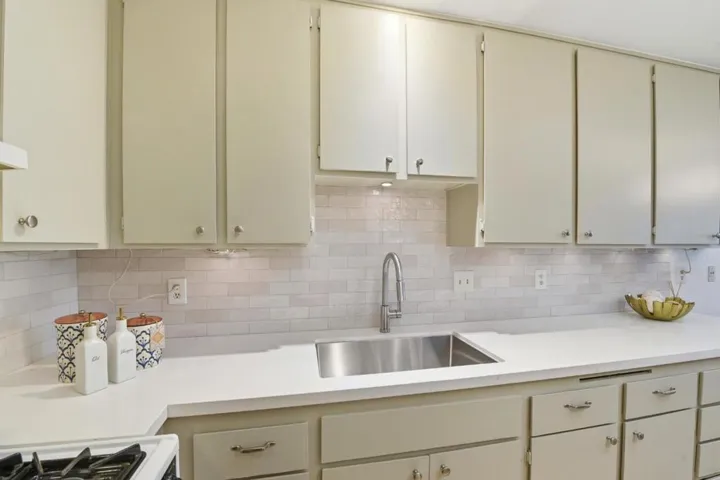 New faucet, new backsplash and counters.