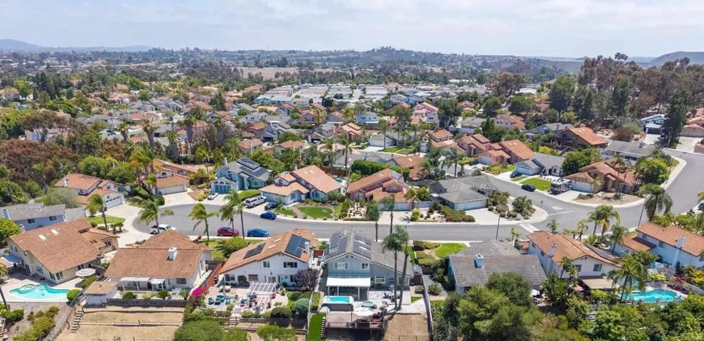 Aerial view from back including the cul-de-sac the home is situated and the surrounding neighborhood