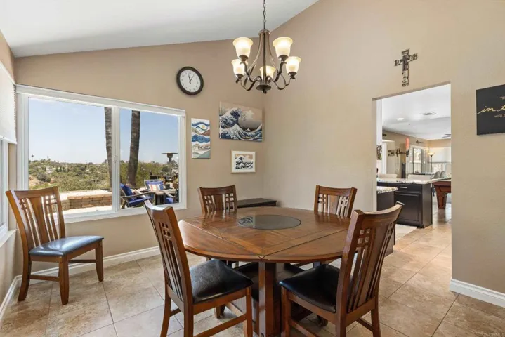 With views to backyard and entrance to kitchen.