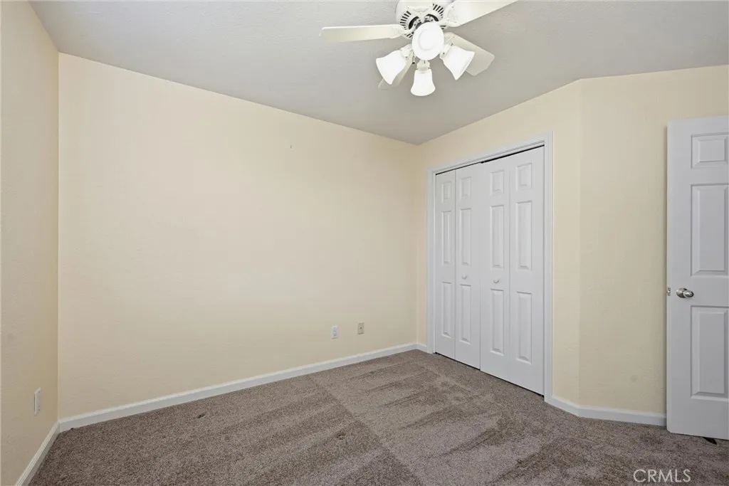 Spacious closets, doorway from hall.  All bedrooms have ceiling fans