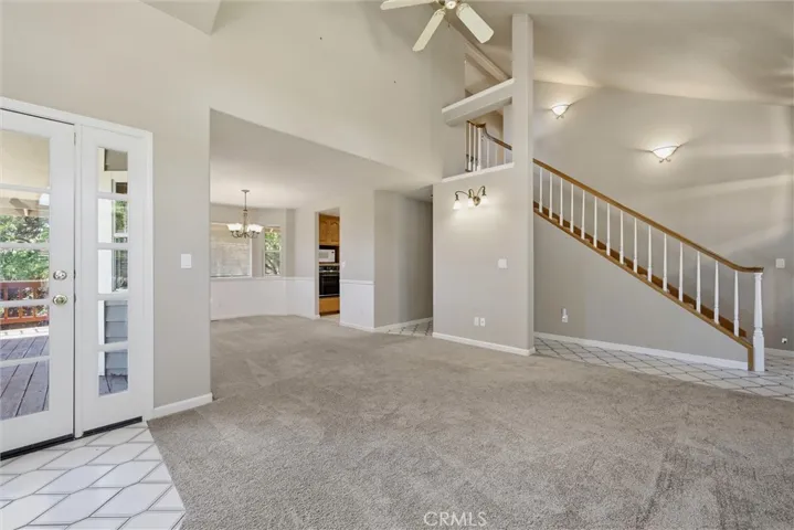 Livingroom photo from front door.  Living room has vaulted ceilings