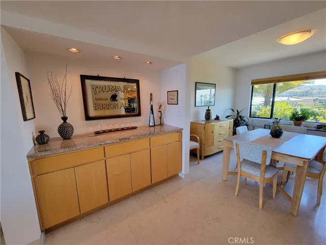 SERVING BAR OFF KITCHEN AND DINING AREA