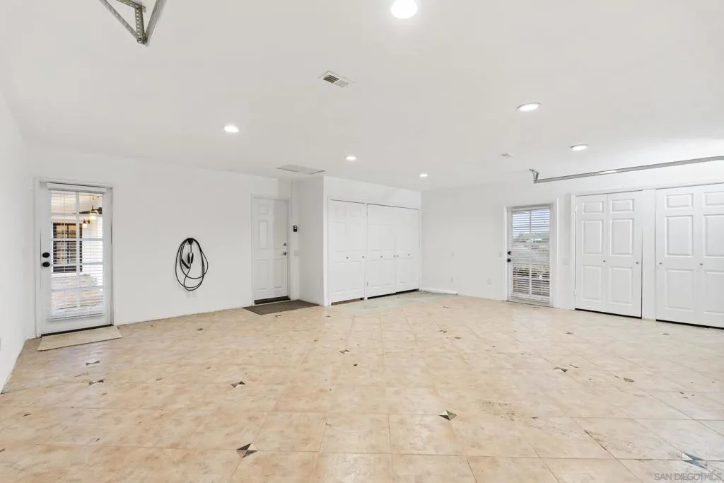 2-car garage with EV charger and storage