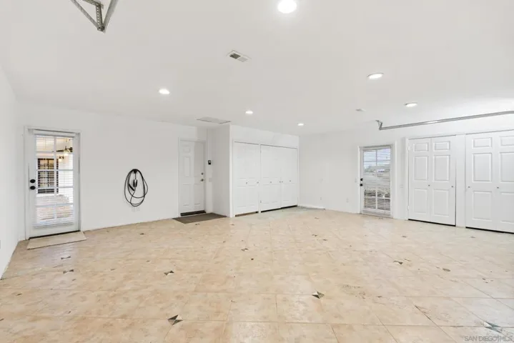 2-car garage with EV charger and storage