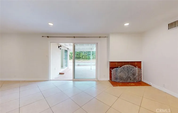 living rm with view of sliding door to backyard
