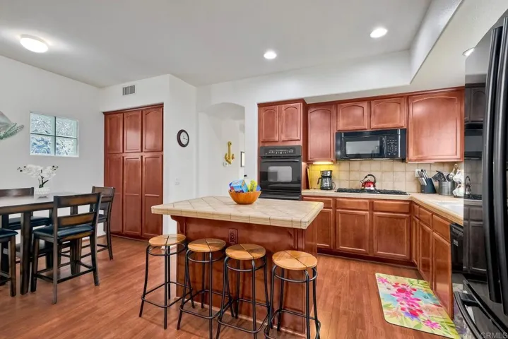 Cook, dine, and socialize in this well-planned kitchen