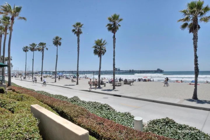 Just steps from soft sandy shores and swaying palm trees