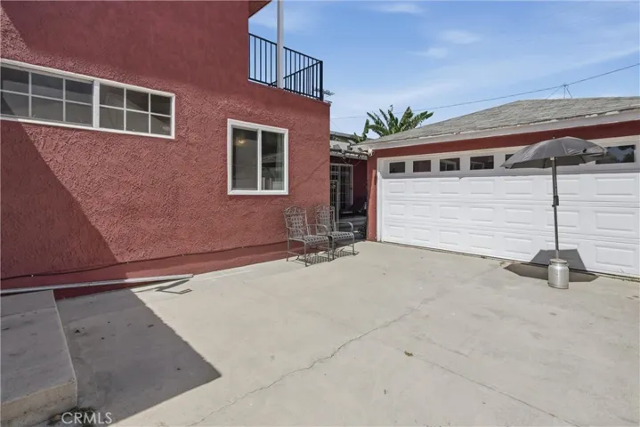 View of the two car garage & parking