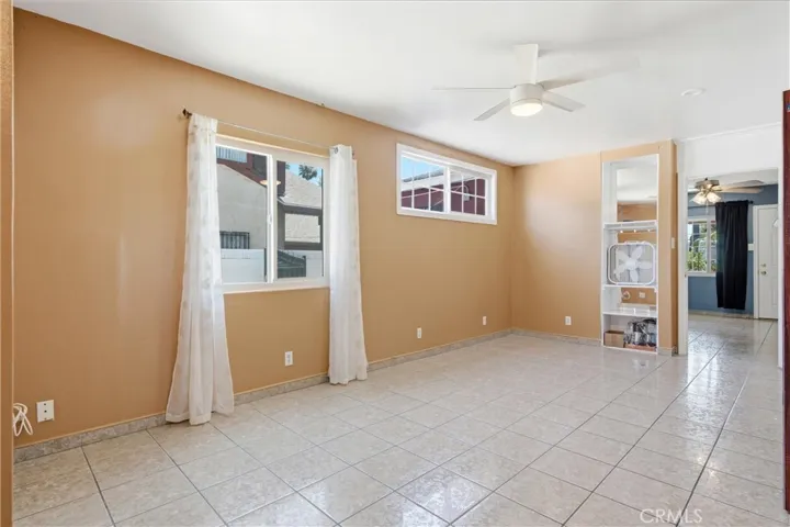 Big family room with ceiling fan