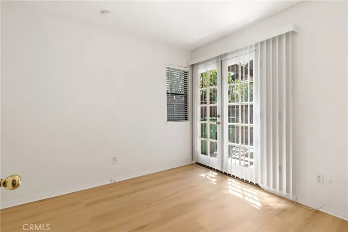 Bed 3 w/french doors to backyard