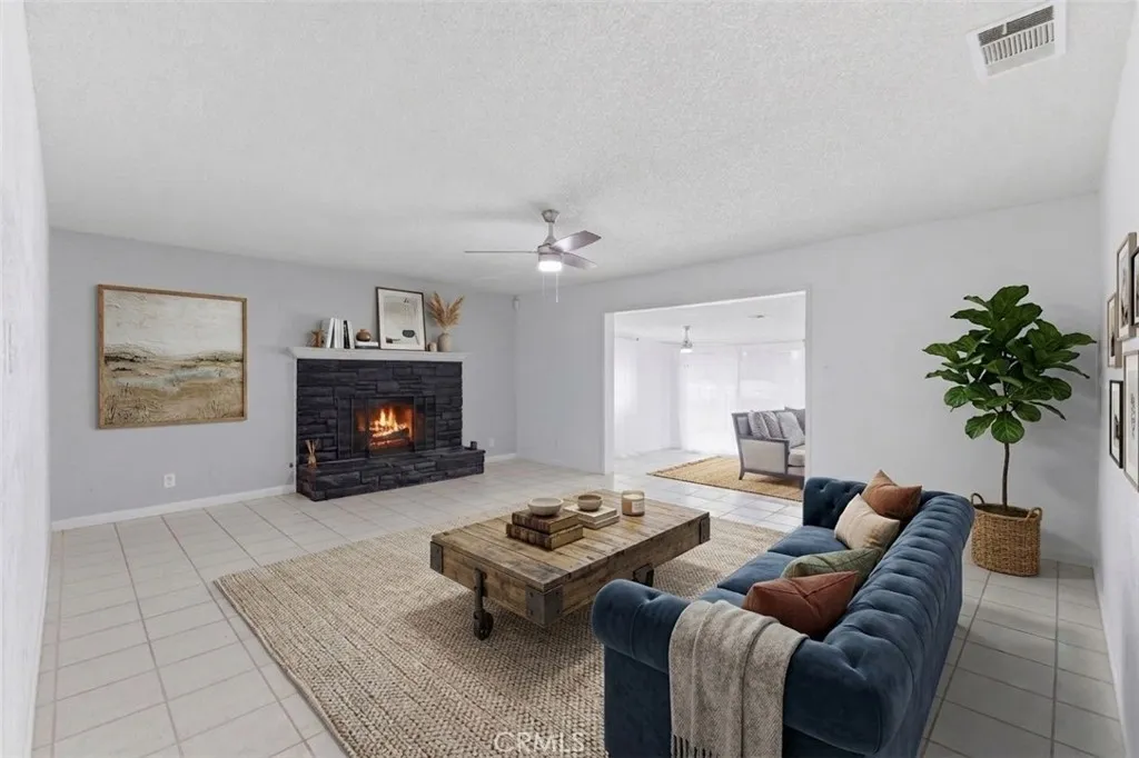 AI rendering of reimagined living room. Flame digitally added