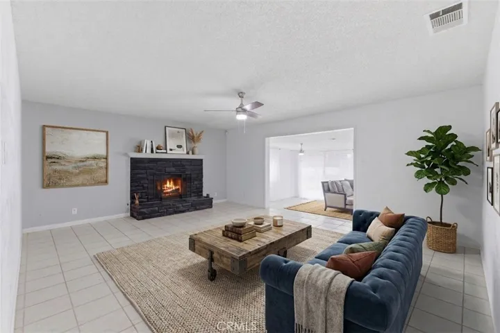 AI rendering of reimagined living room. Flame digitally added