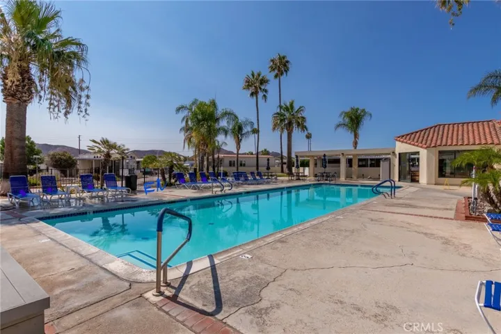 Resort pool with 2 hot tubs, bar and picnic areas.
