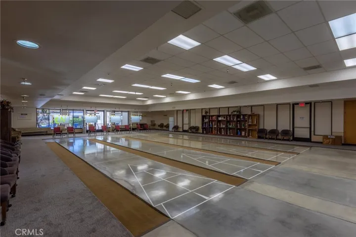 Shuffleboard Pavilion with bleachers and digital scoing board