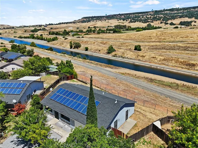 Rooftop with view in background.