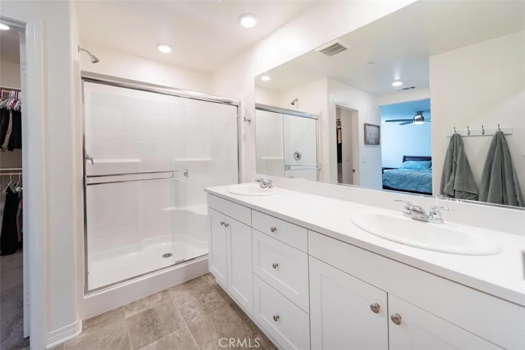 Dual sinks, walk-in shower