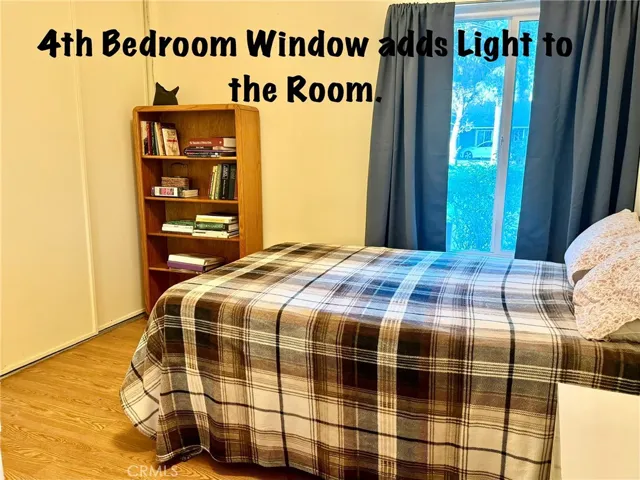 4th Bedroom w/different layout and bedspread.