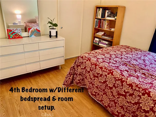 4th Bedroom w/different layout and bedspread.