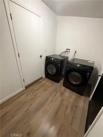 Laundry room with washer and dryer hook up.