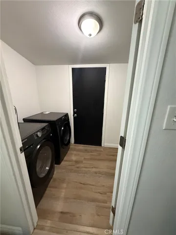 Laundry room with washer and dryer hook up.