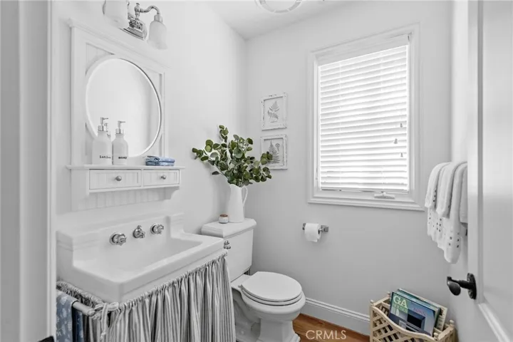 HALF BATH OFF LAUNDRY ROOM