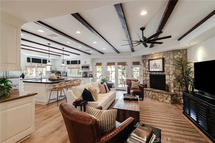 FAMILY ROOM WITH GAS FIREPLACE OPENING TO LANAI