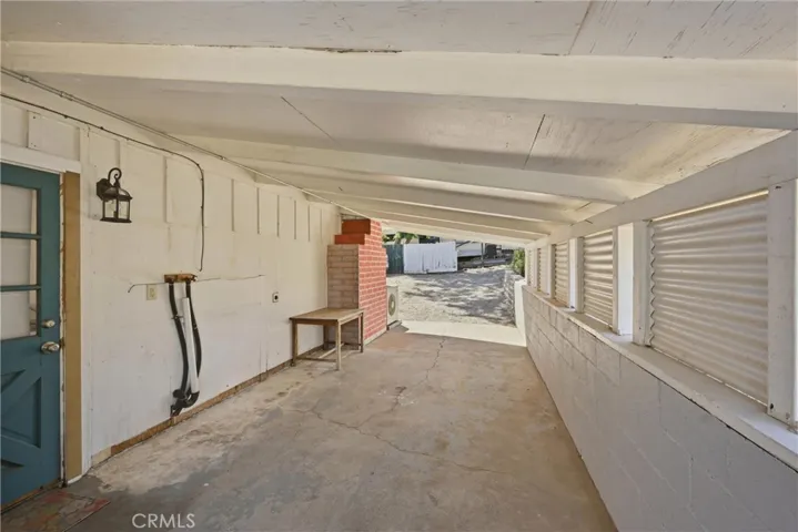Carport has washer and dryer hookups.