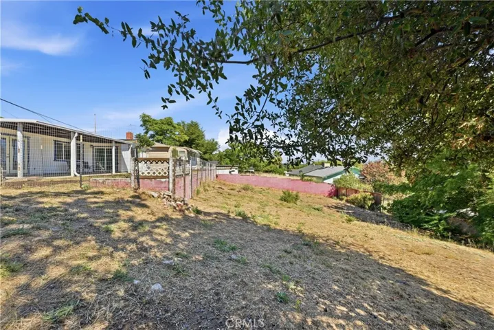 Yard has a large lower level