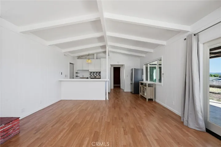 Hallway leads to 2 bedrooms and the bathroom.