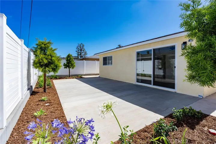 Direct back patio access through oversized 8'0" dual pane sliding door.
