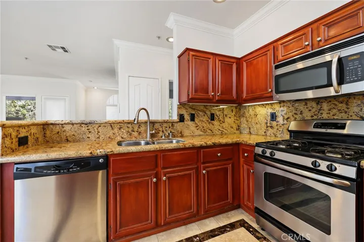 Well-appointed kitchen with stainless steel appliances.